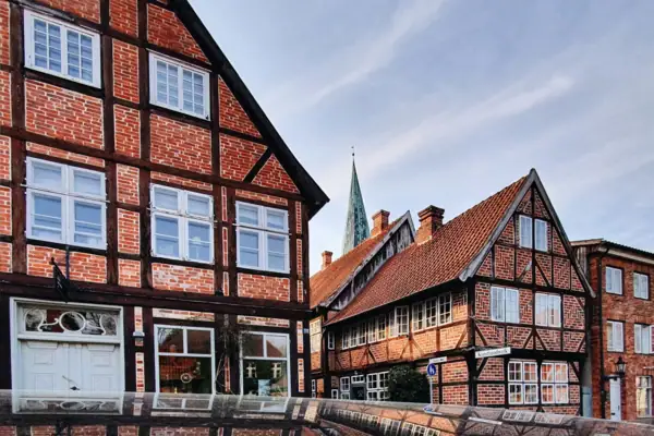 Reflection of a building in a puddle