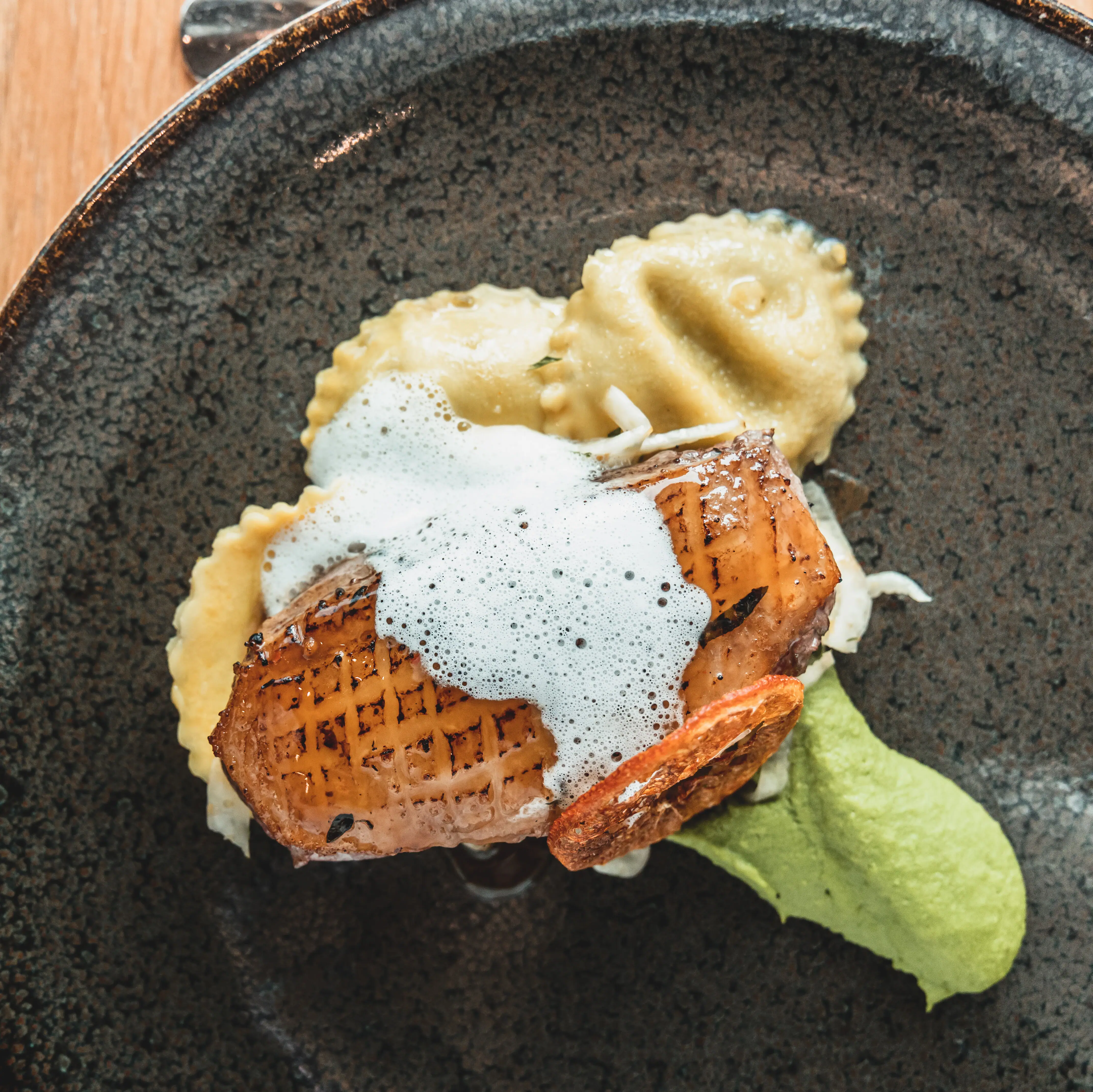 Plate with pasta A plate with food, fork and knife.