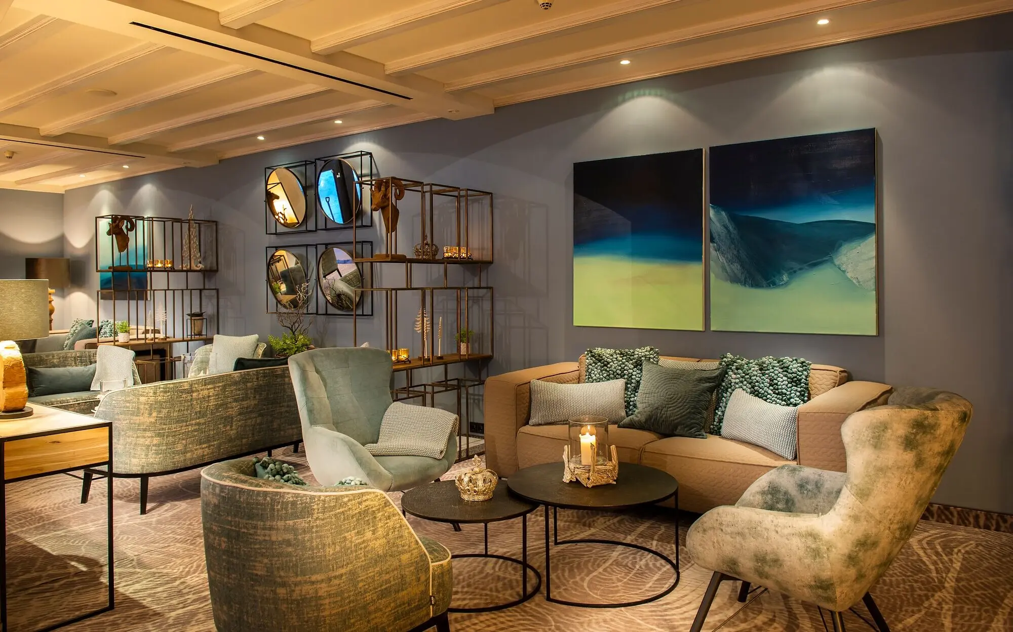 Interior with couch, armchairs and coffee table.