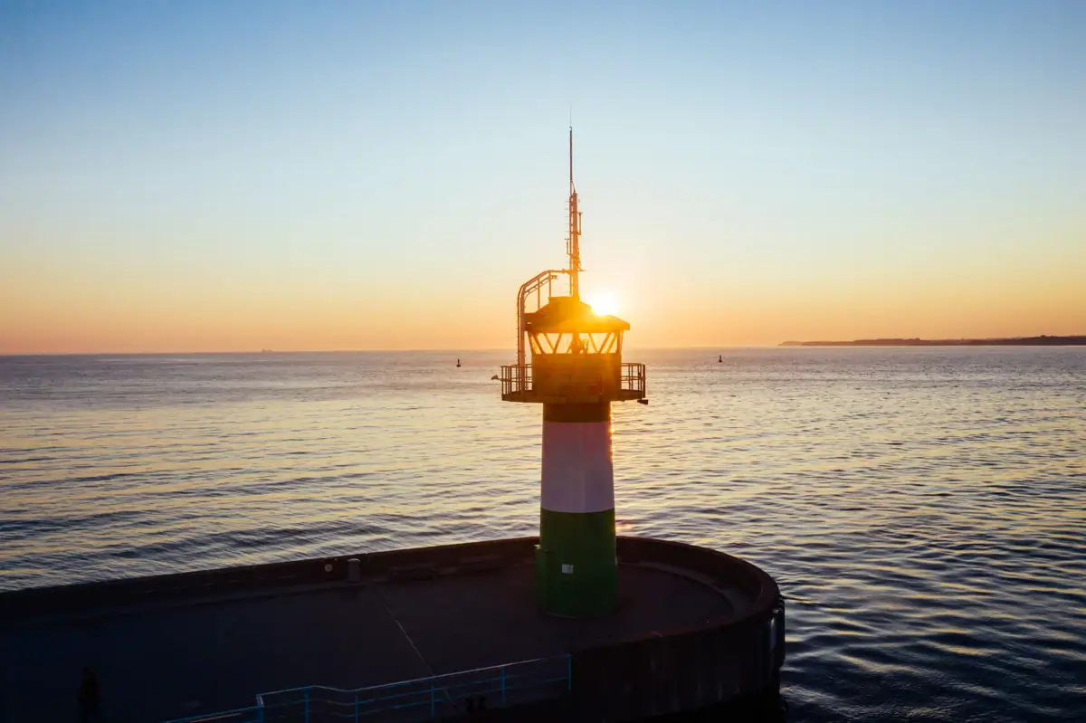 Pier lights A lighthouse on a jetty in the water.