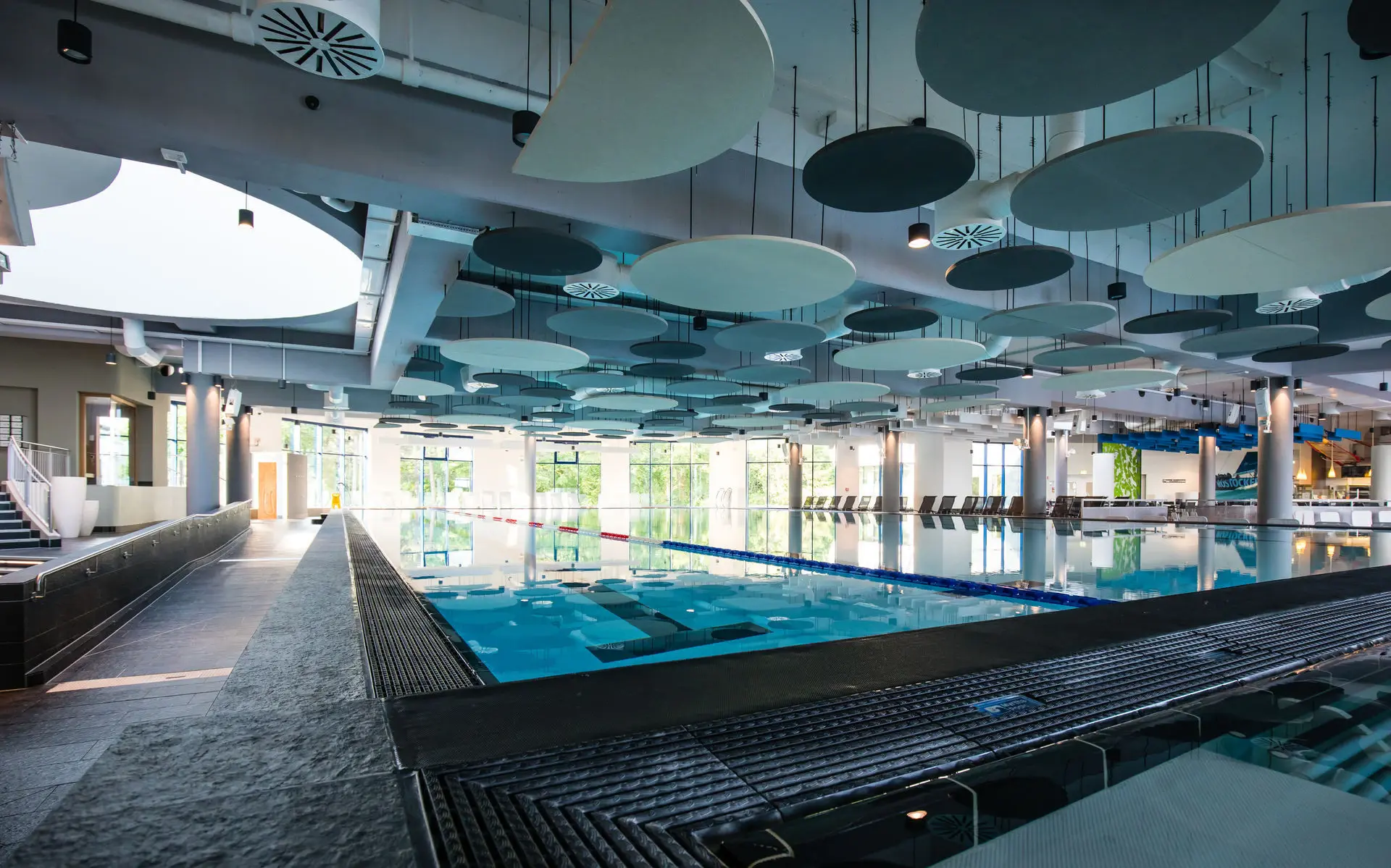 An indoor pool with lanes.