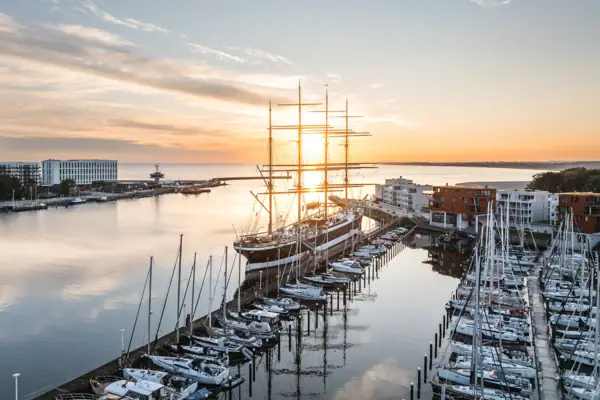 Passat A large ship in the harbour at sunrise.