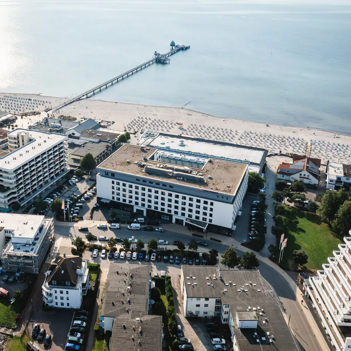 Aerial view of a beach and buildings.