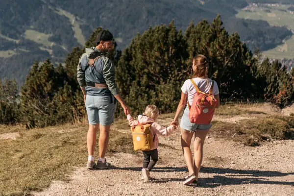A family is hiking on a mountain.