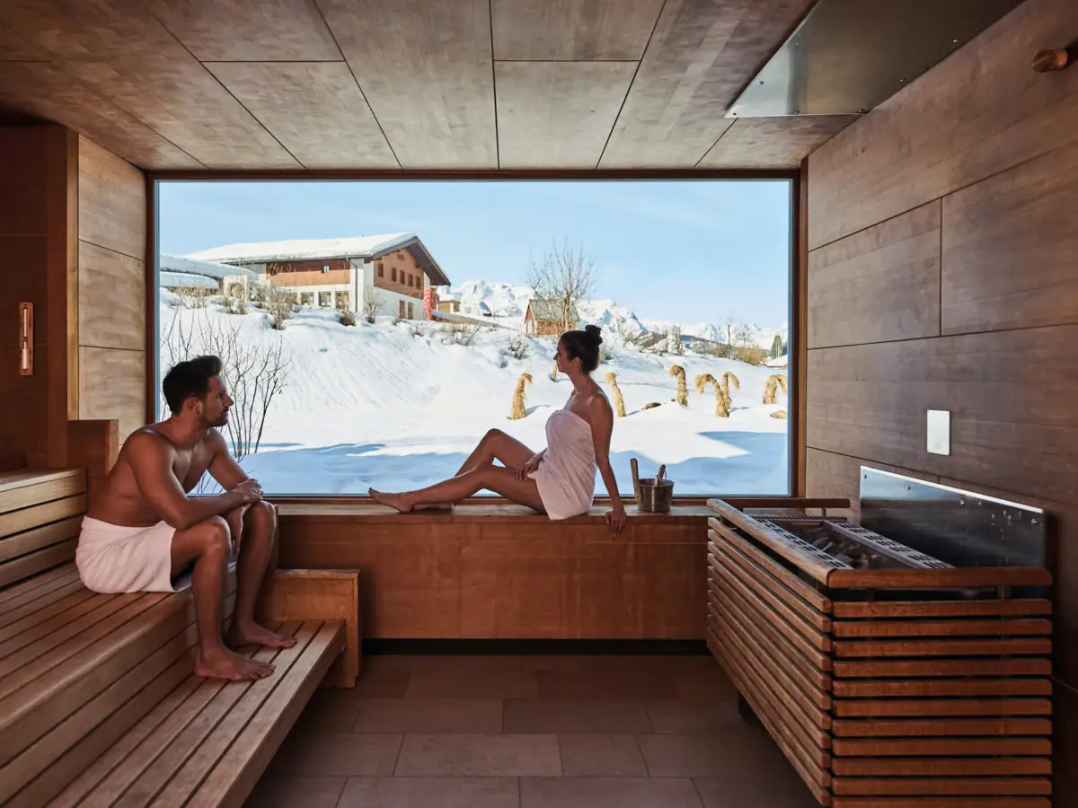 Sauna in winter Two people sitting in the sauna