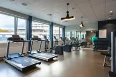 Fitness room A room with fitness equipment, including a treadmill.