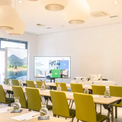 A room with tables and chairs.
