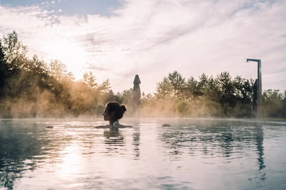 Pools at the aja Bad Saarow A woman in a body of water.