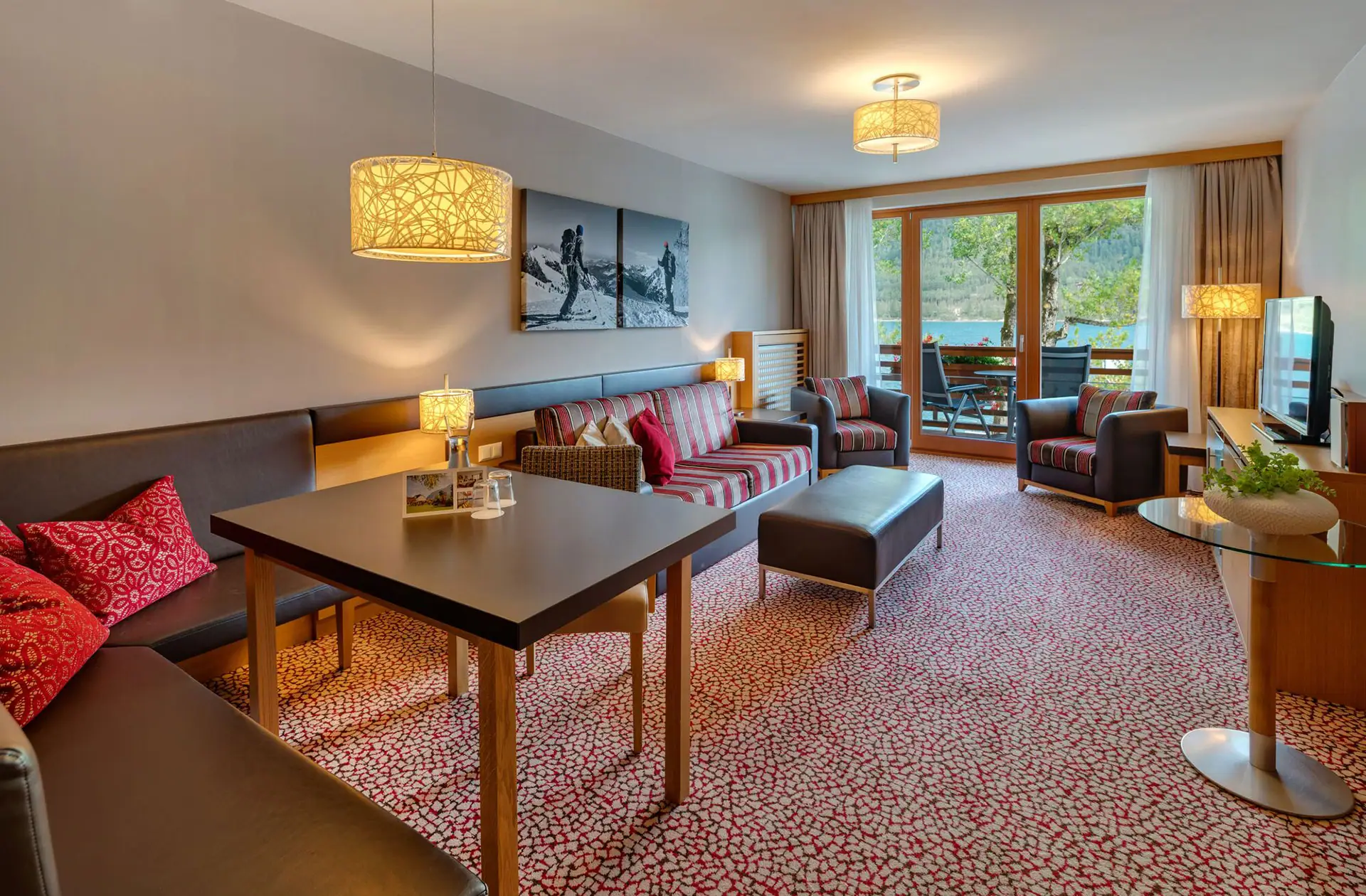 Suite A room with a table and chairs.