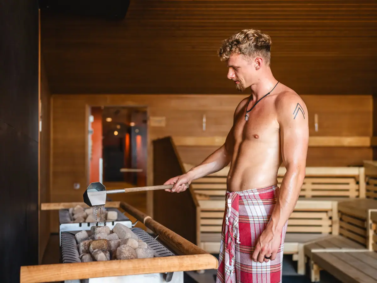 A man in red and white chequered shorts.