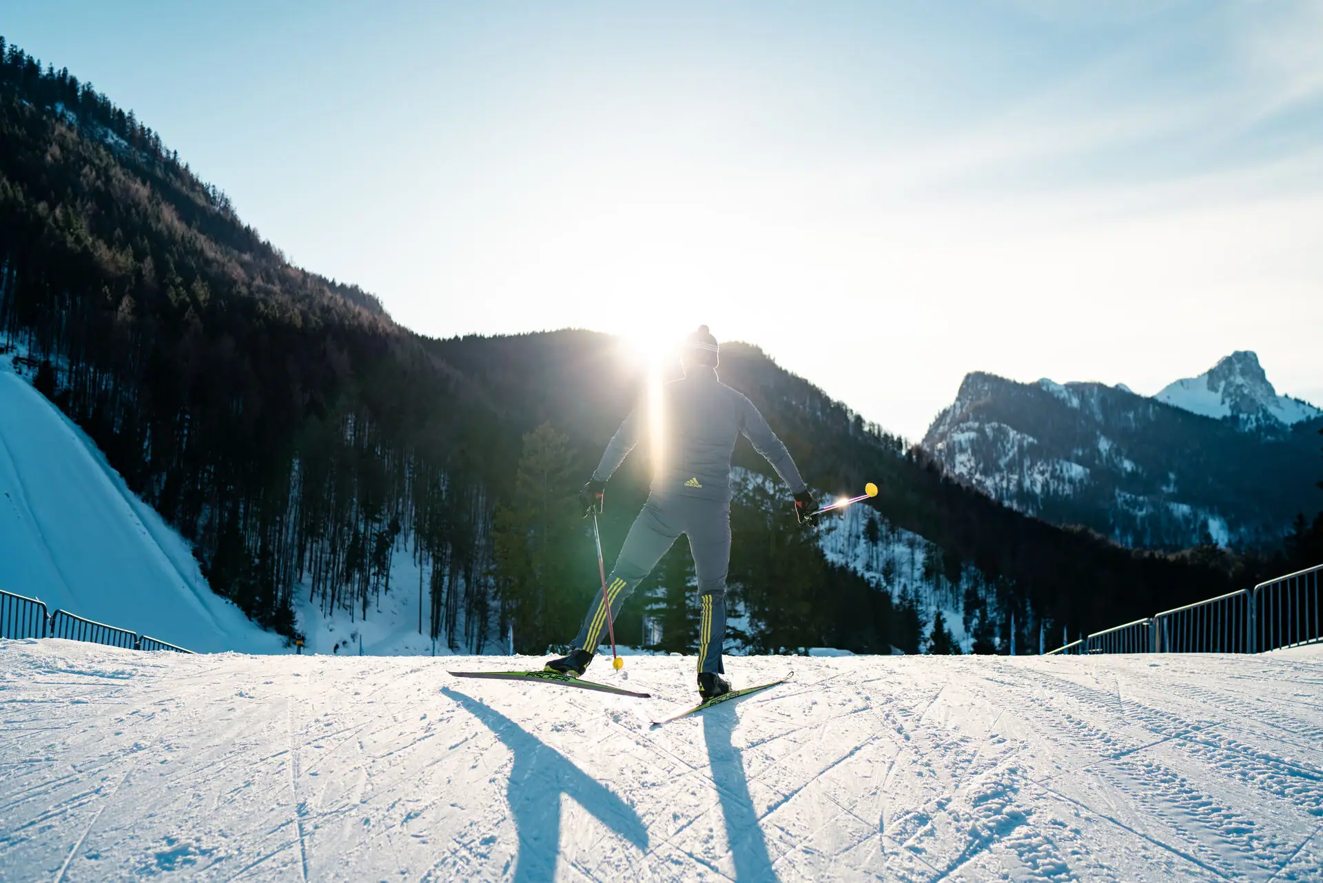 Winter sports A person on skis on a snowy hill.