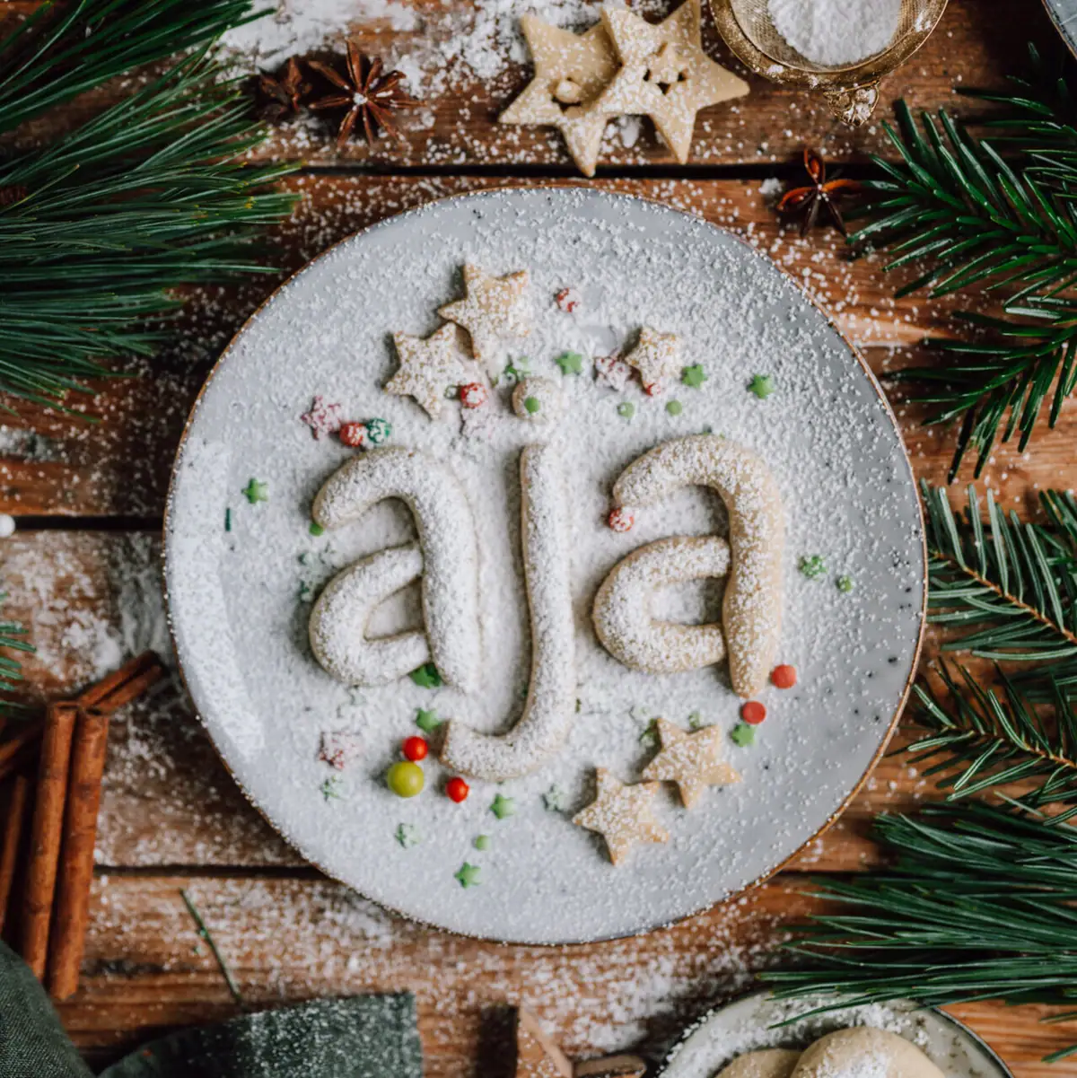 aja biscuits A plate with biscuits and a name on it.