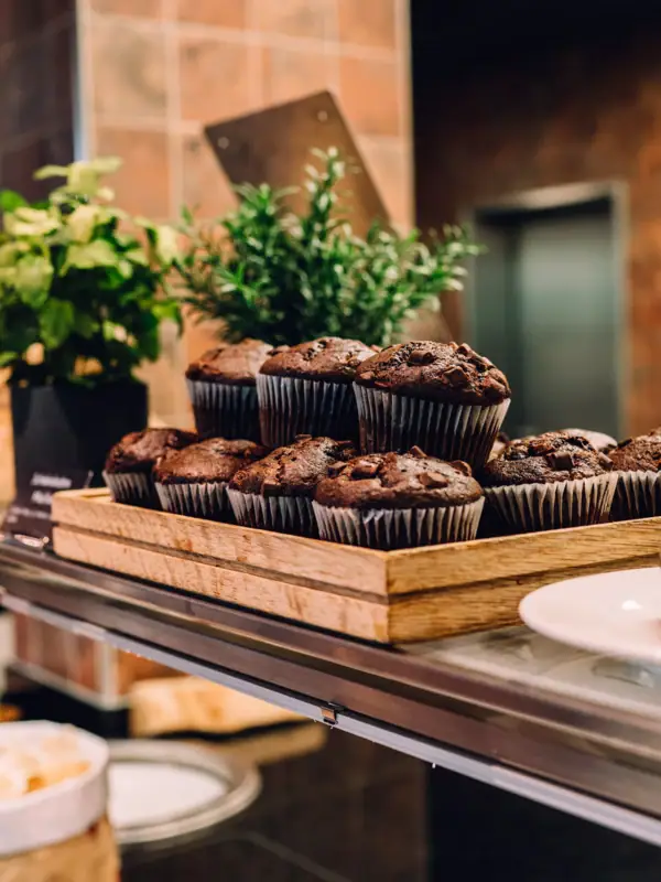 Tray with muffins on a table