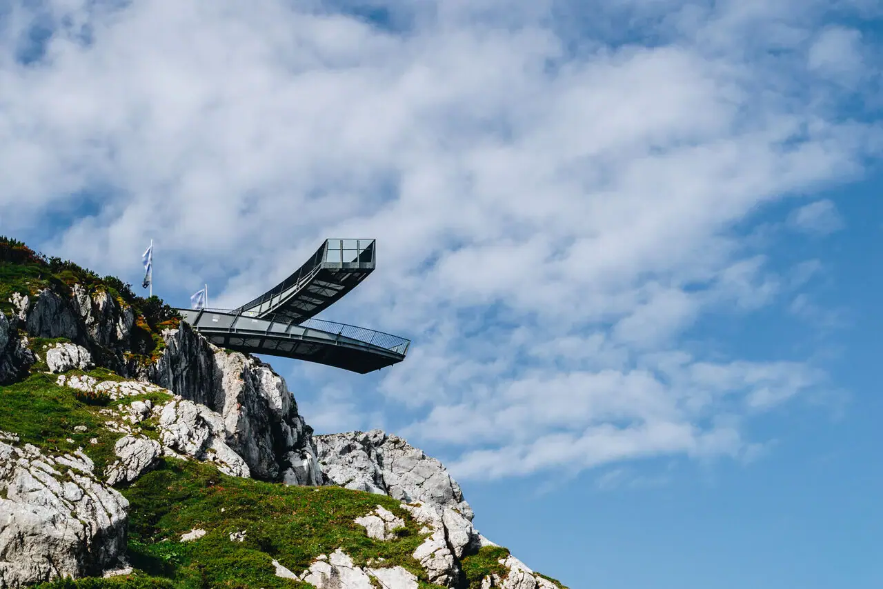 The Alpspix platform in X shape over a cliff.