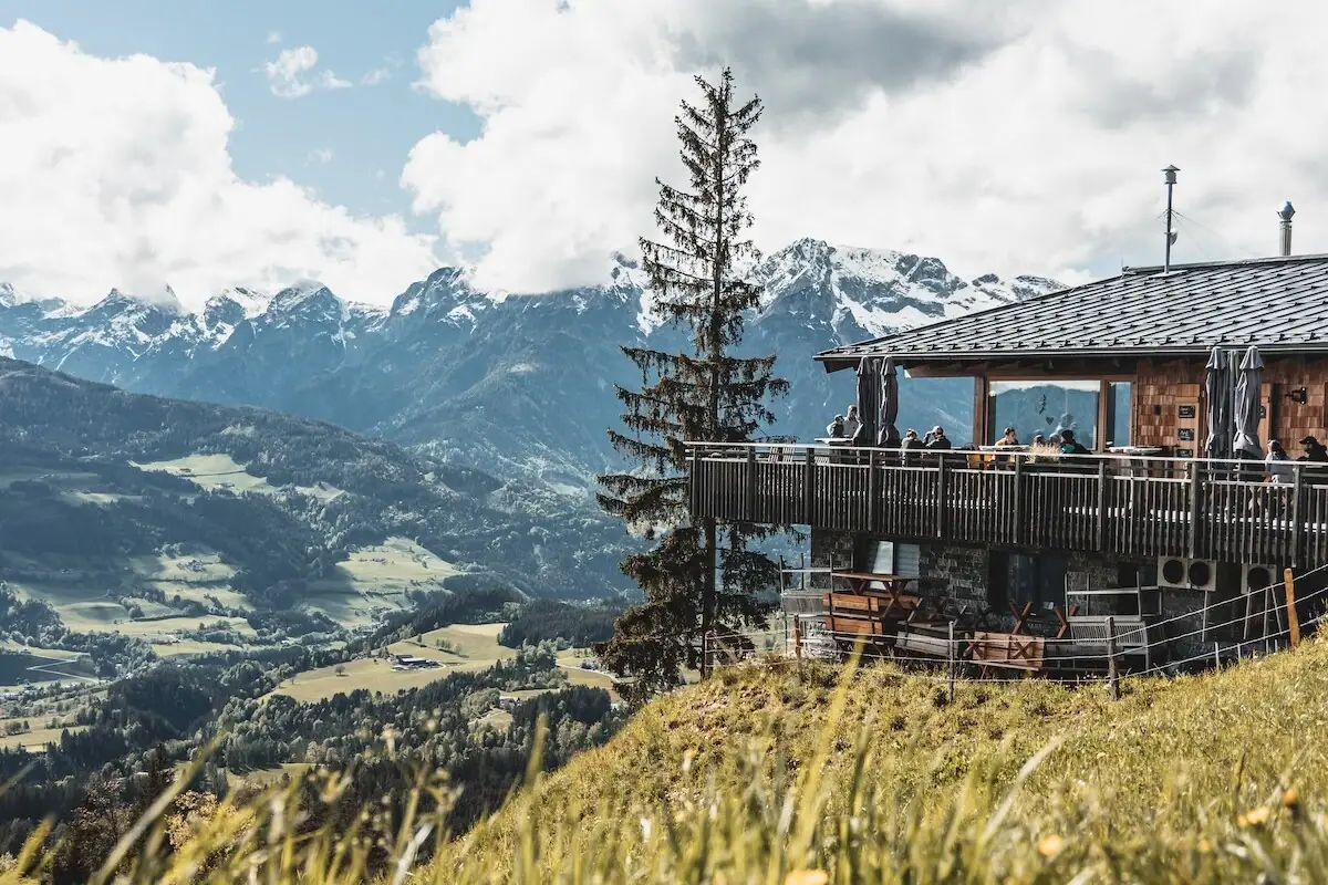 A building with a balcony overlooking a valley.