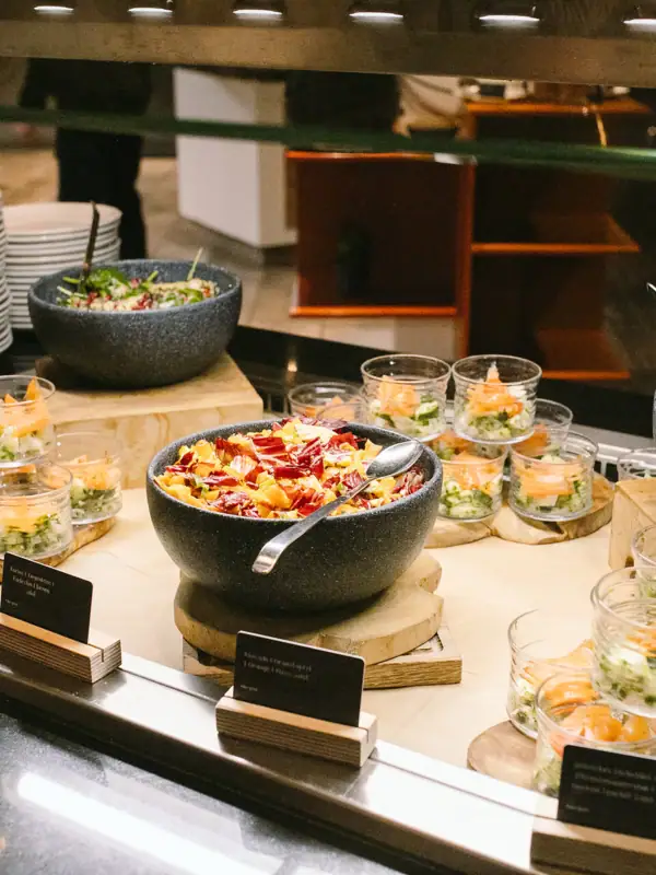 Buffet with a selection of dishes on a table.