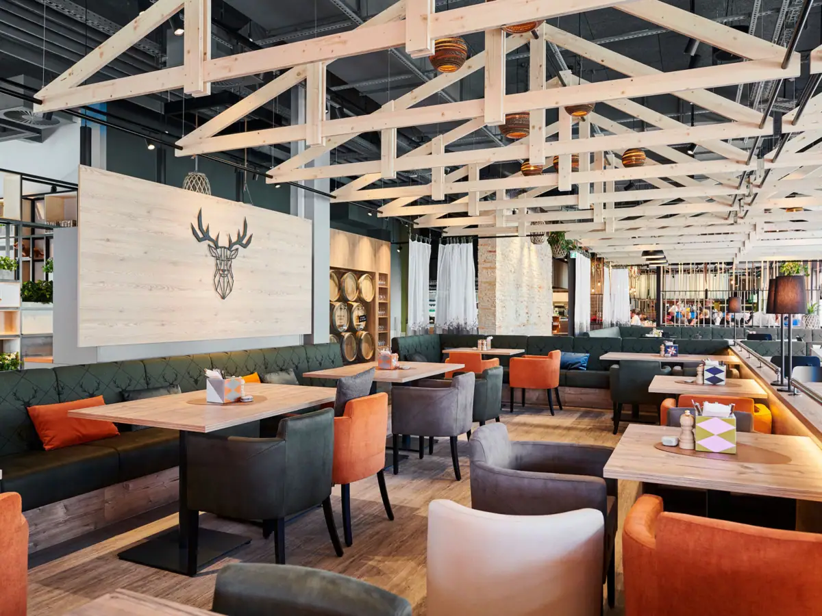 Restaurant with indoor tables and chairs.