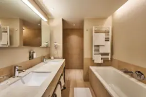 Bathroom A bathroom with bathtub and washbasin.