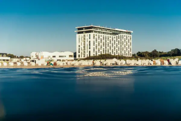 A building next to a beach.