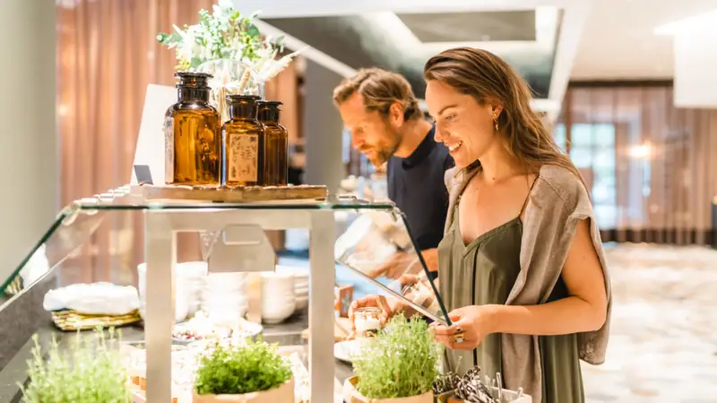 Buffet A woman looks at a buffet.