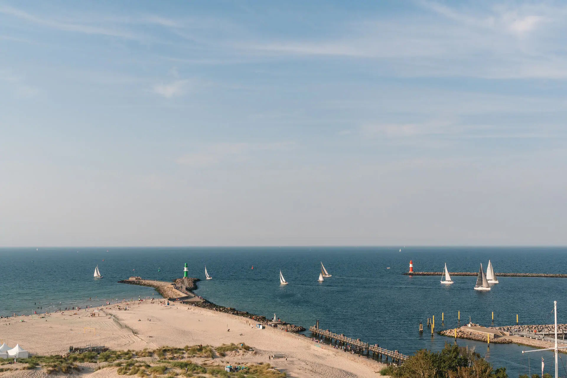Beach with boats on the water