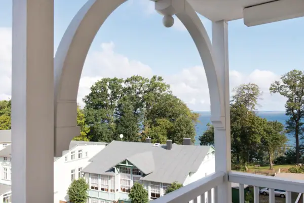 View from a balcony of a house outside.