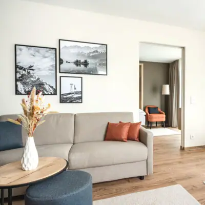 Living room A living room with sofas and armchairs.