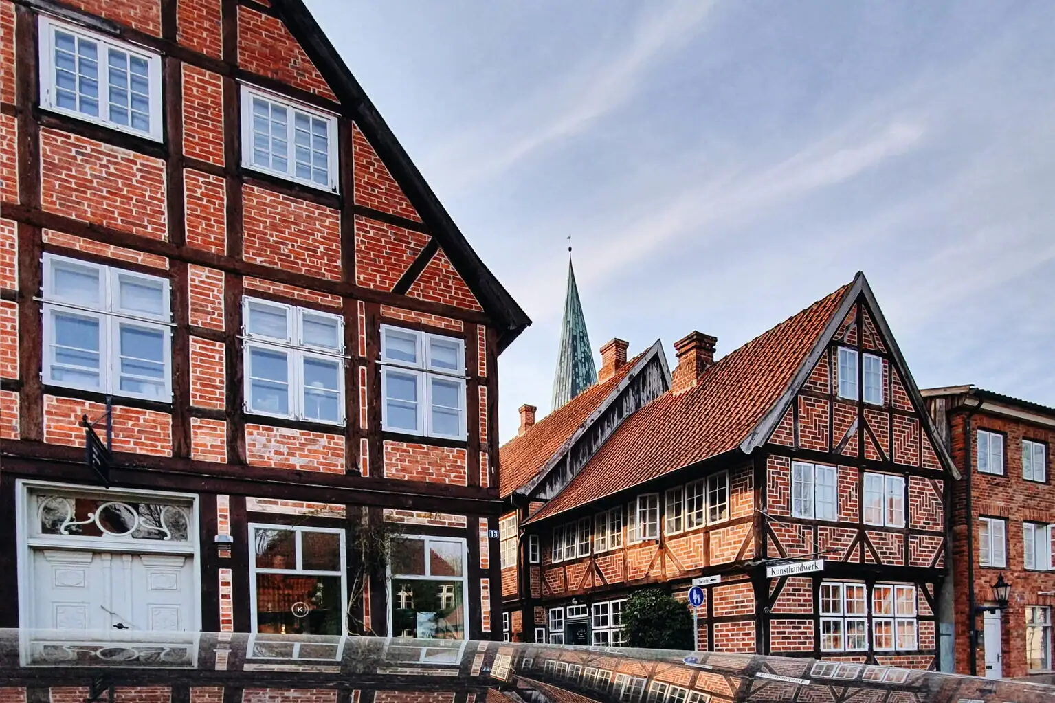 Reflection of a building in a puddle