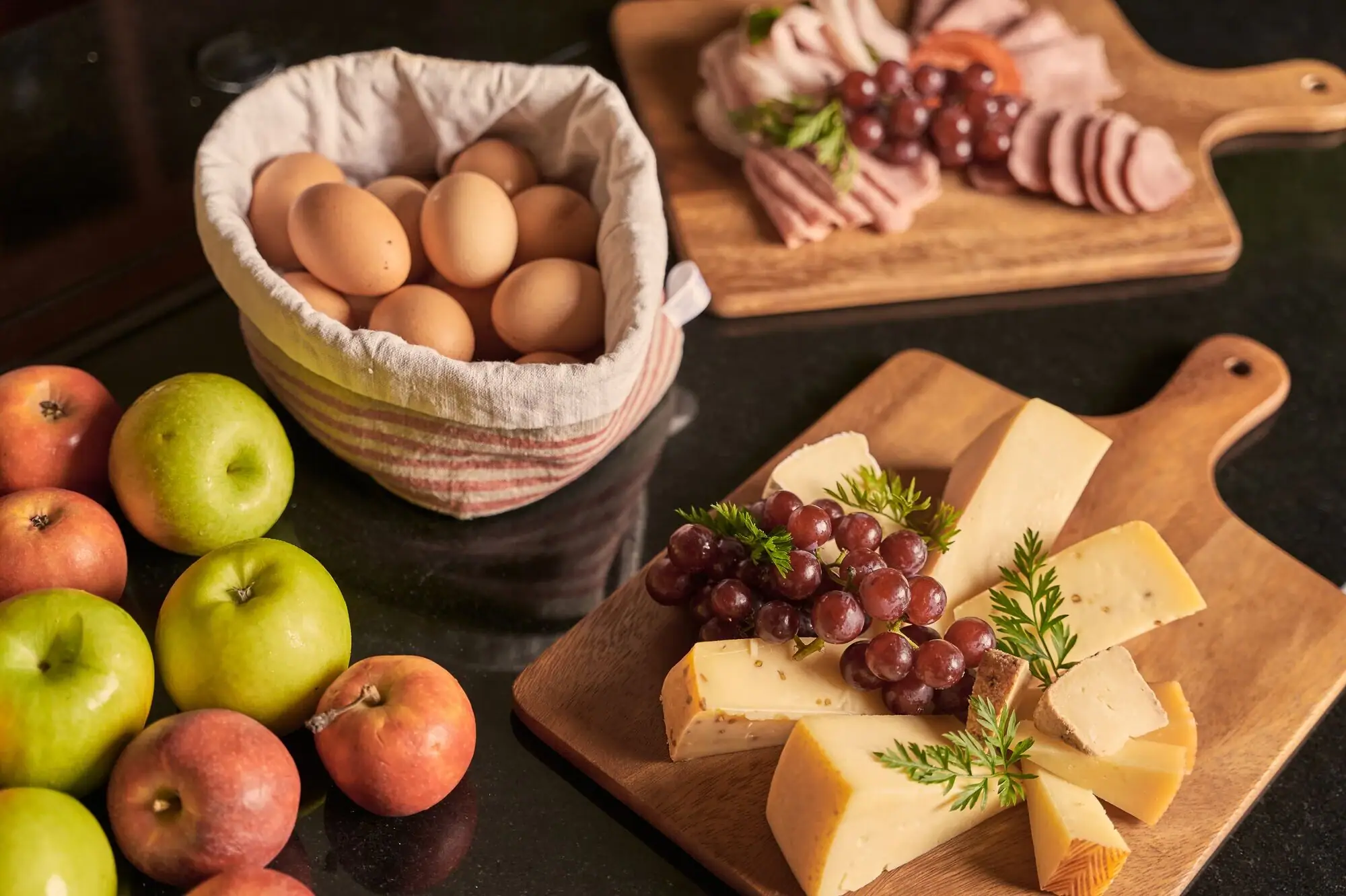Various fresh natural products on a table, including fruit and vegetables.