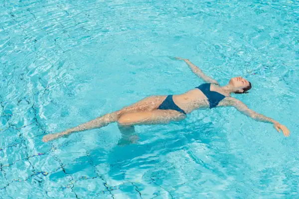 A woman in the swimming pool.