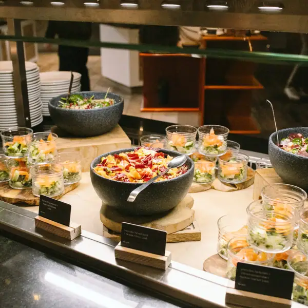 Buffet with a selection of dishes on a table.