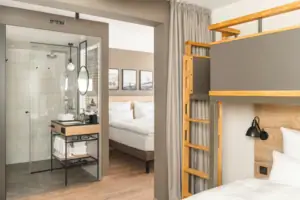 Family room A room with a bed and a shower.