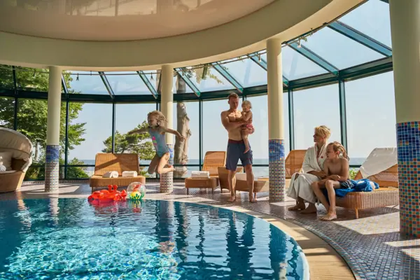 A group of people by the pool.
