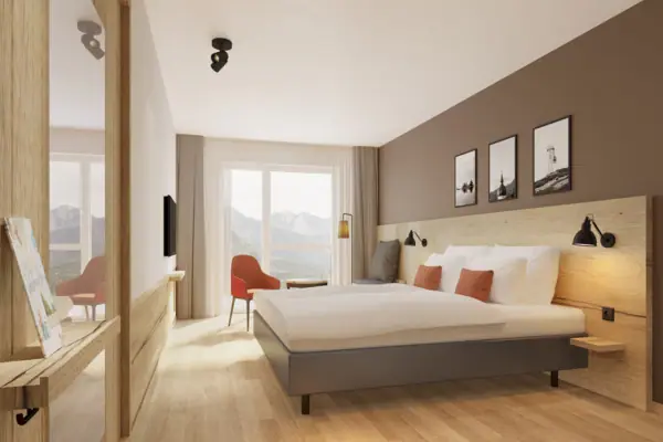 Bedroom with a bed and a chair