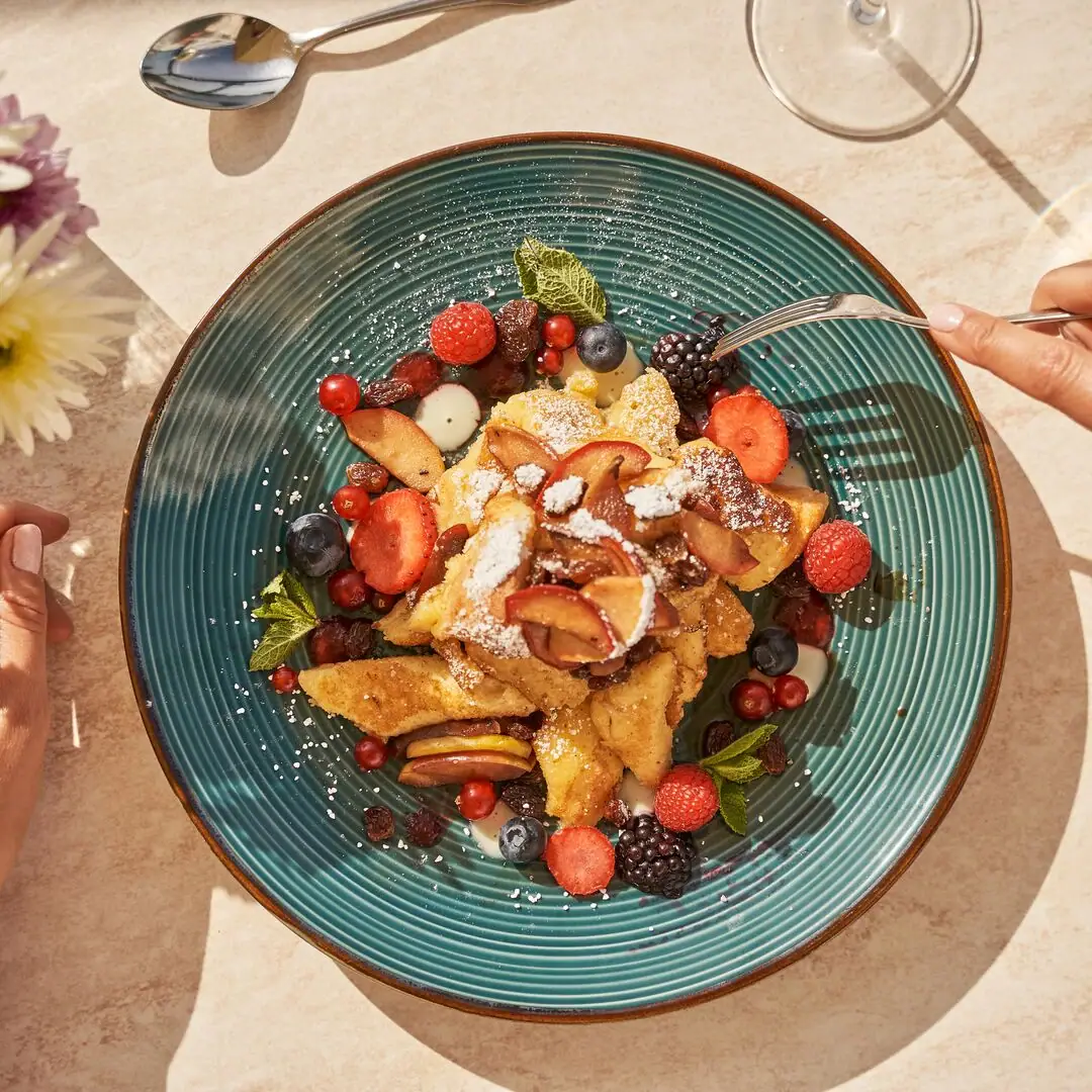 Dessert A plate of fruit and berries.