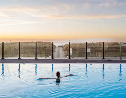 Outdoor pool aja Warnemünde Girl swimming in a pool outdoors.