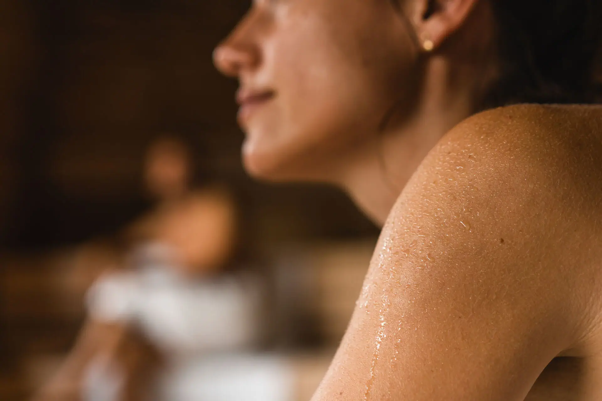 Steam bath Close-up of a female shoulder