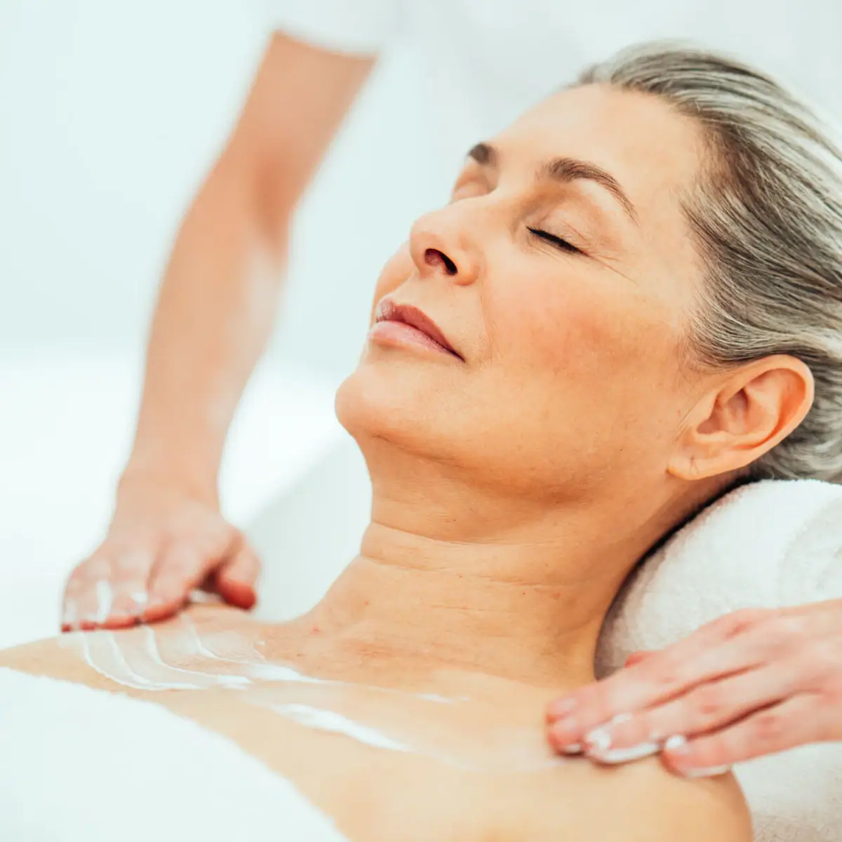 SPA application A woman receives a body scrub.