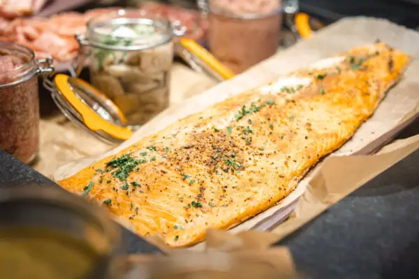 Salmon A fish on a tray.