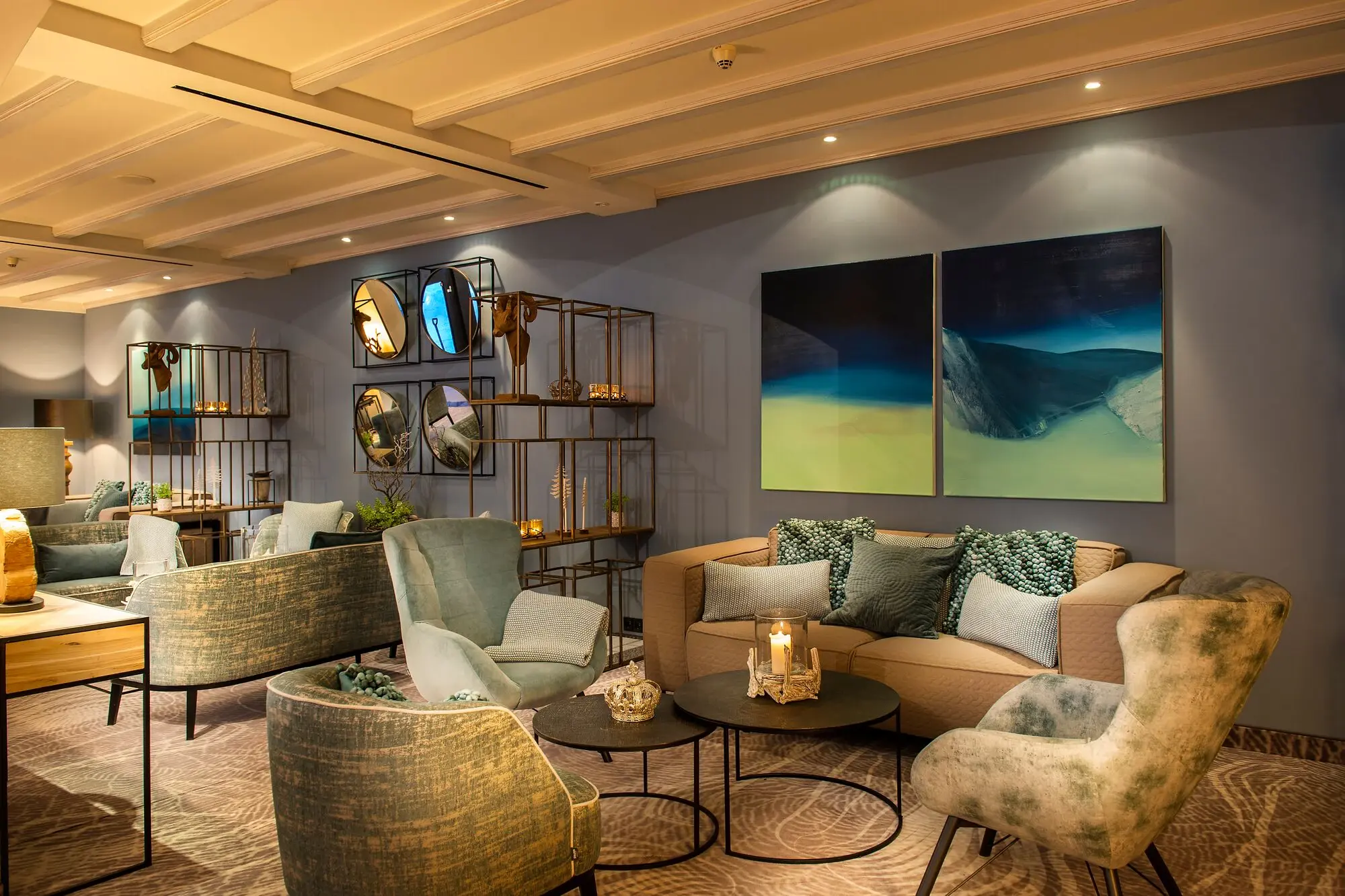 Interior with couch, armchairs and coffee table.