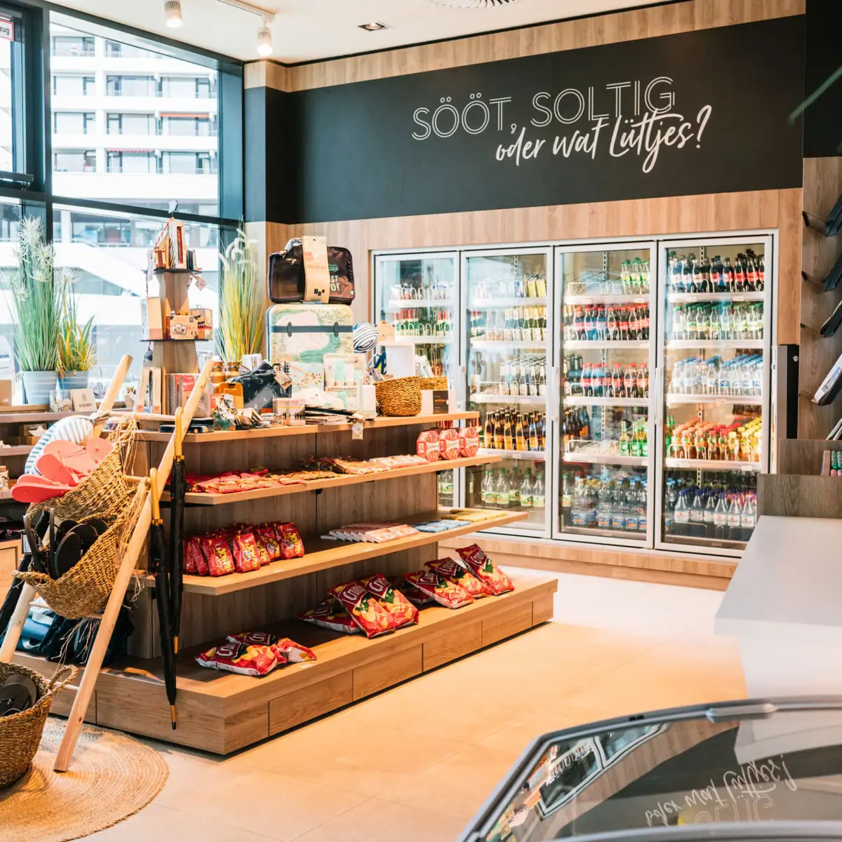 A shop with shelves full of food and drinks.