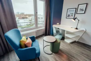 A room with a desk and chair.