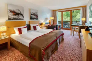 Double room Hotel room with bed and chairs.