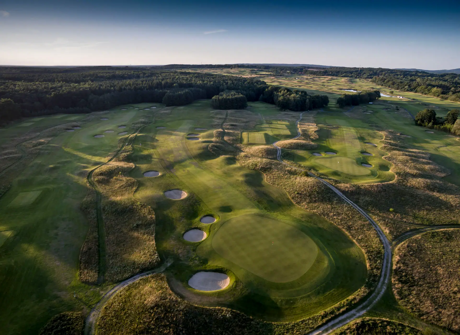 Golfing in Bad Saarow Bird's eye view of the golf course with several sand bunkers