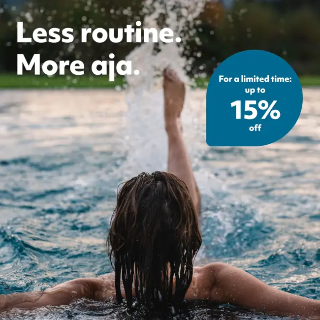 Less routine. More aja. A woman swimming in a pool.