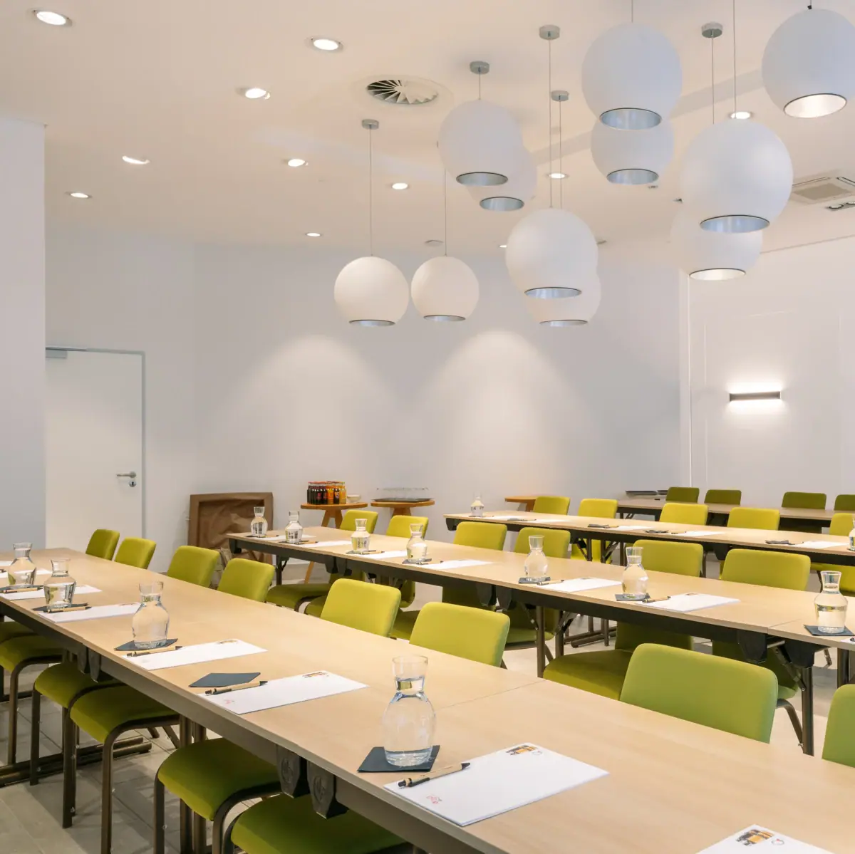 A room with tables and chairs.