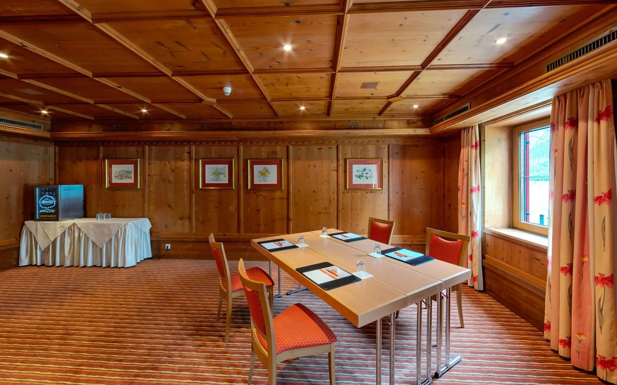 Meeting room with one table and four chairs.