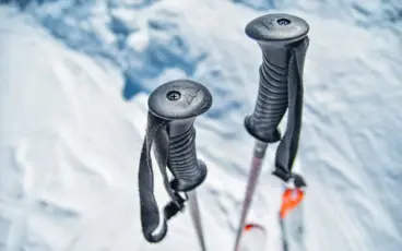 Two ski poles in the snow.