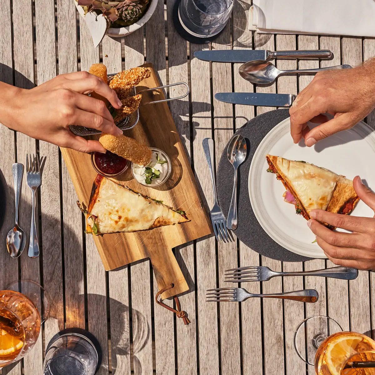 A person is eating fast food at a table.