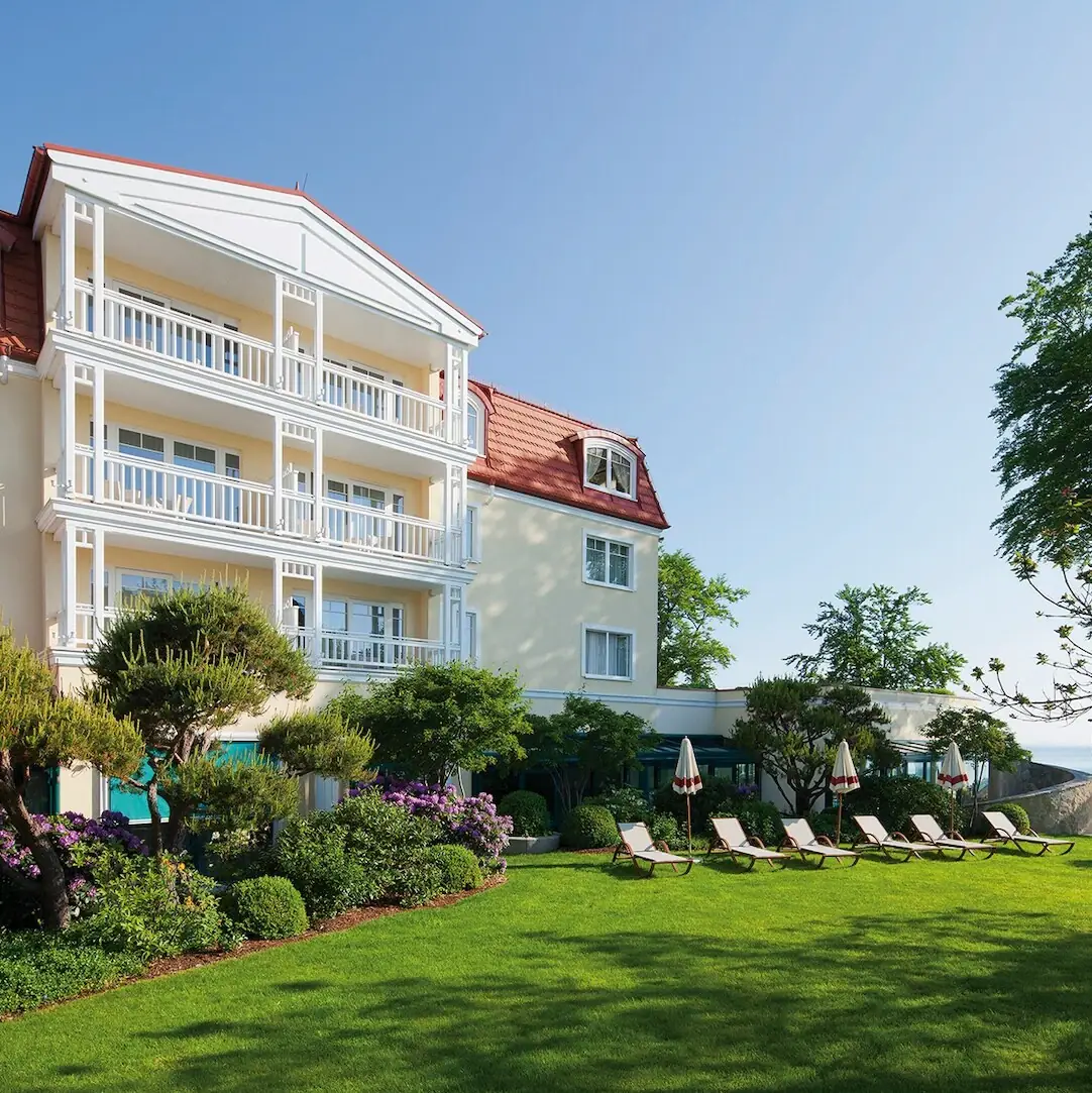Lawn with chairs in front of a building